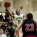 Huron junior Antonio Henry shoots in the game against Pickney on Monday, March 4. Daniel Brenner I AnnArbor.com